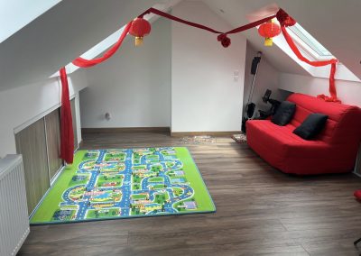 Aménagement de combles dans le 93 procédé Intégra sur charpente à fermettes W bois pente 35° (93160 Noisy-le-Grand)